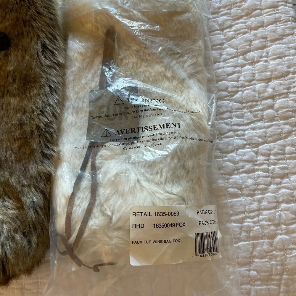 Pottery Barn Wine Bag in faux white fox Brand new and unused.